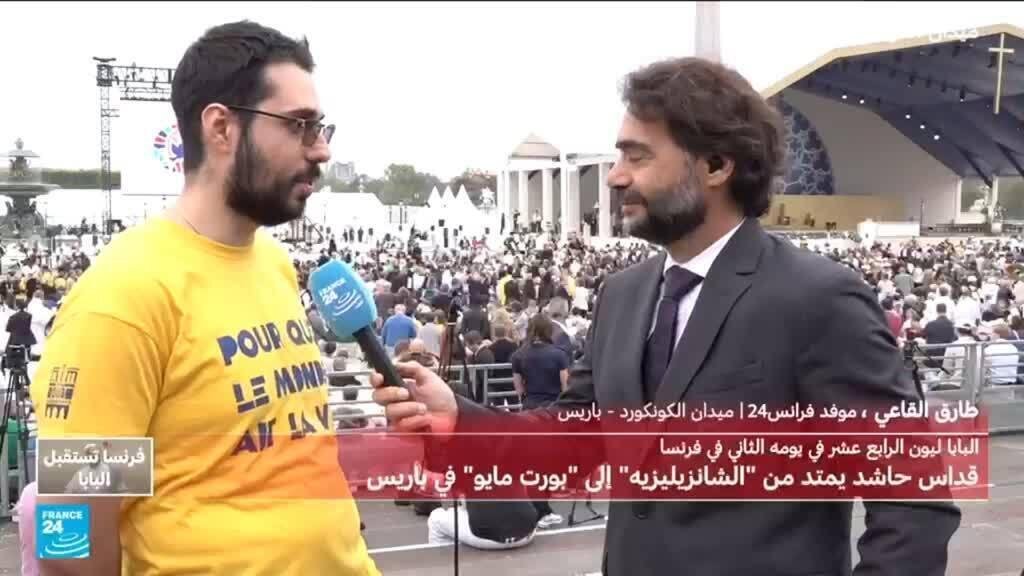 متطوعون يساهمون في تنظيم قداس البابا في باريس
